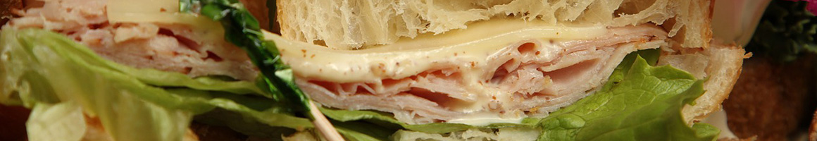 Eating Sandwich Cheesesteak at Tony Luke's restaurant in Springfield, PA.